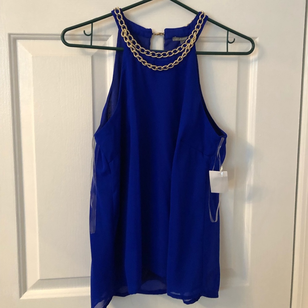 Royal blue shirt that flows at the waist